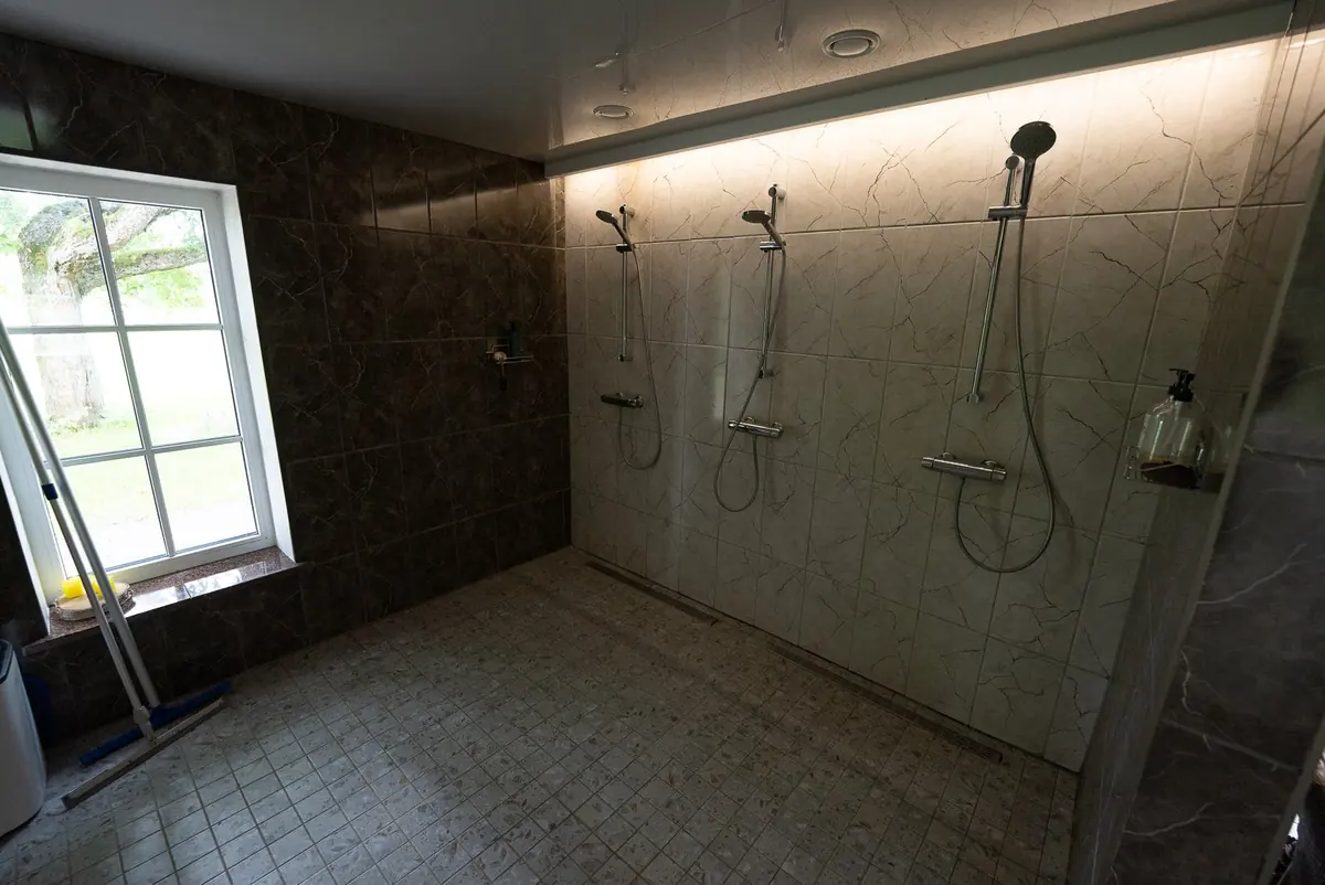 Spa shower room with three showers